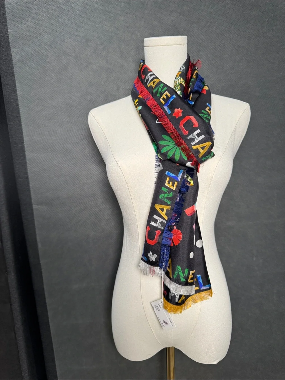 CHANEL Black Floral Logo Silk Scarf with Red Fringe
